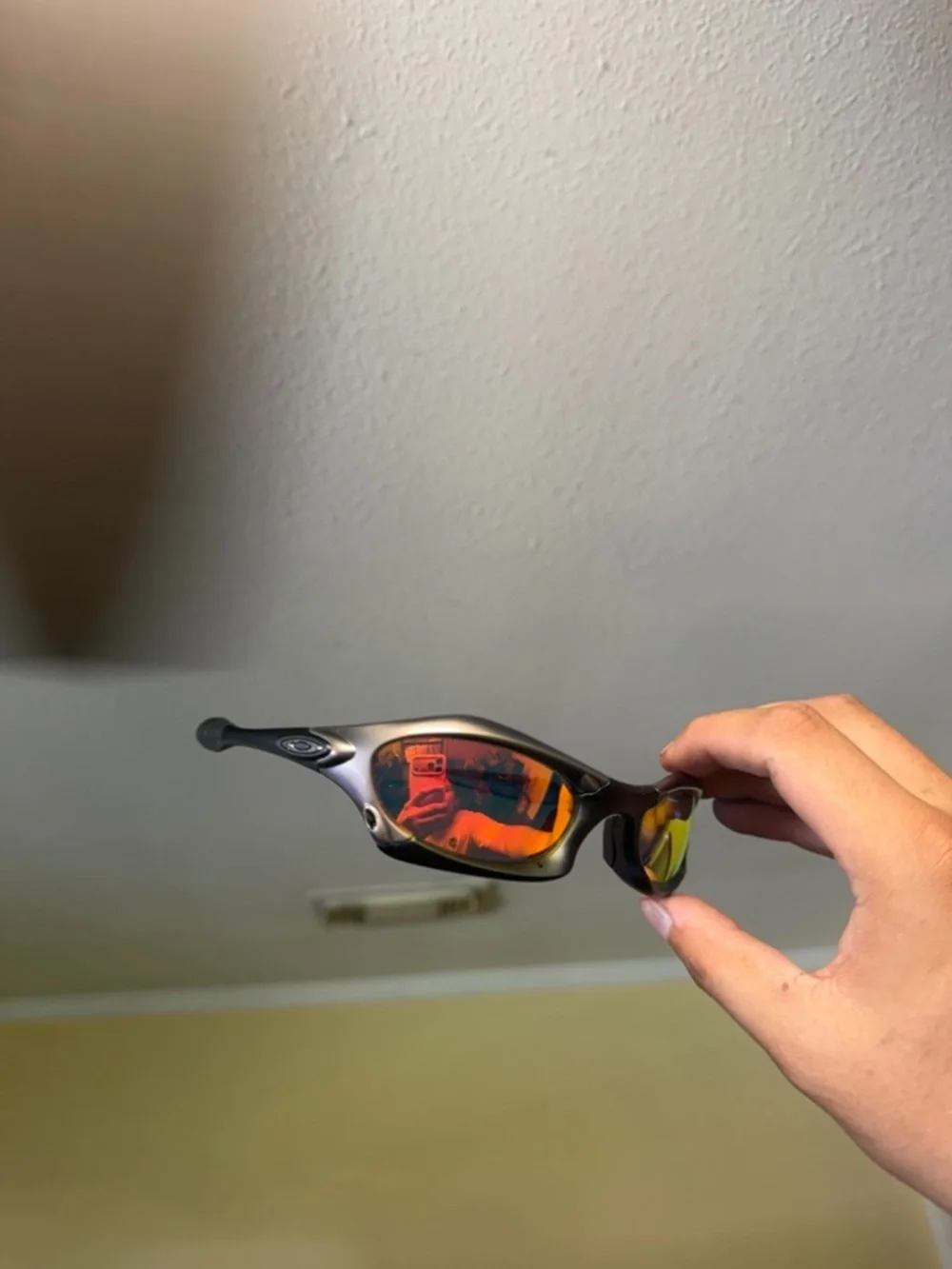 Oakley Sunglasses - Black Frame with Red-Orange Mirrored Lenses oaks